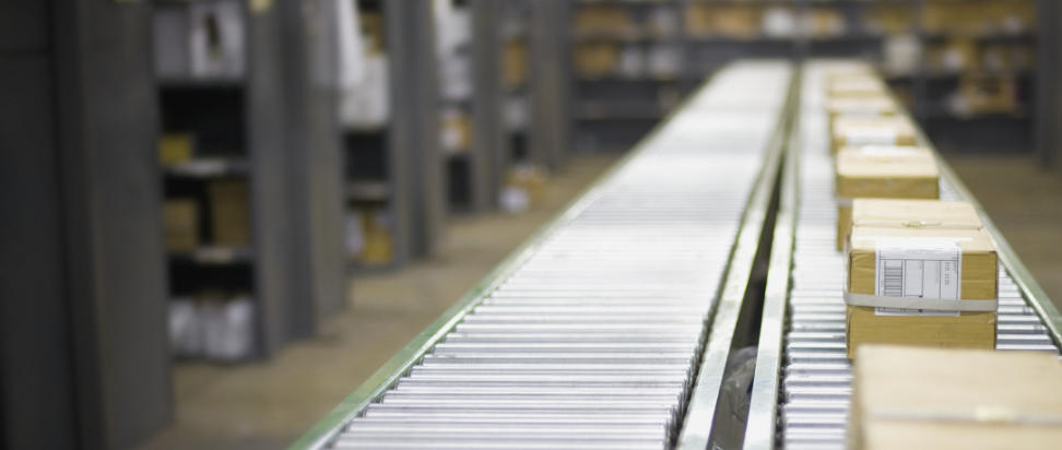Packages on a conveyor belt.